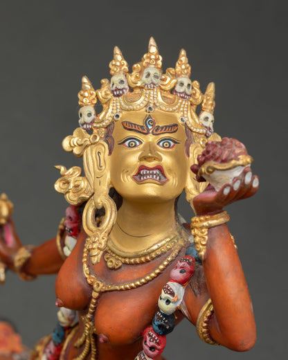 Close up Vajrayogini face gold painted details Newari artisan wrathful goddess statue for Vajrayana wisdom protection practice