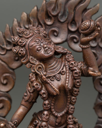 Close up view of Vajrayogini face showing tantric dakini expression with Himalayan Newari craftsmanship details