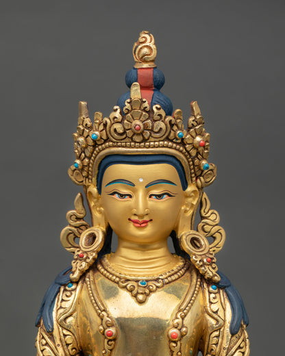 Close up view of Amitayus Buddha statue showing detailed gold painted face, semi precious stone ornaments, and intricate Himalayan Newari craftsmanship