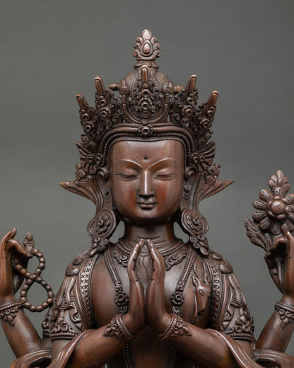 Close up view of Chenrezig sculpture showing gently closed eyes, detailed facial features