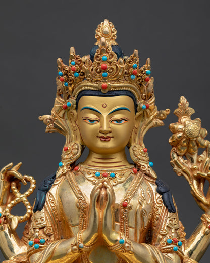 Close up view of Chenrezig statue with serene gold painted face symbolizing compassion and enlightened awareness