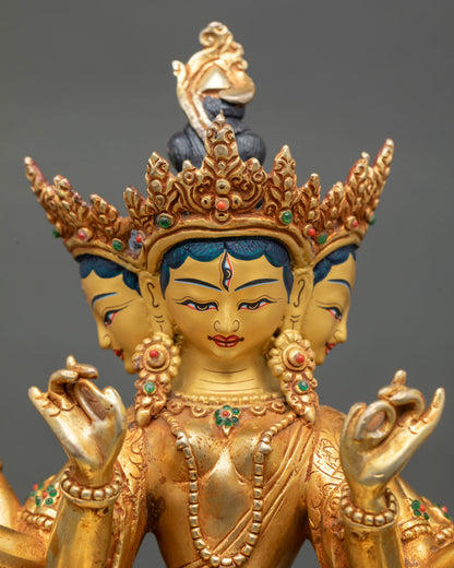 Close up view of Dhoja Devi statue gold painted face with intricate Newari craftsmanship detailed ornamentation and sacred Vajrayana Buddhist art expression