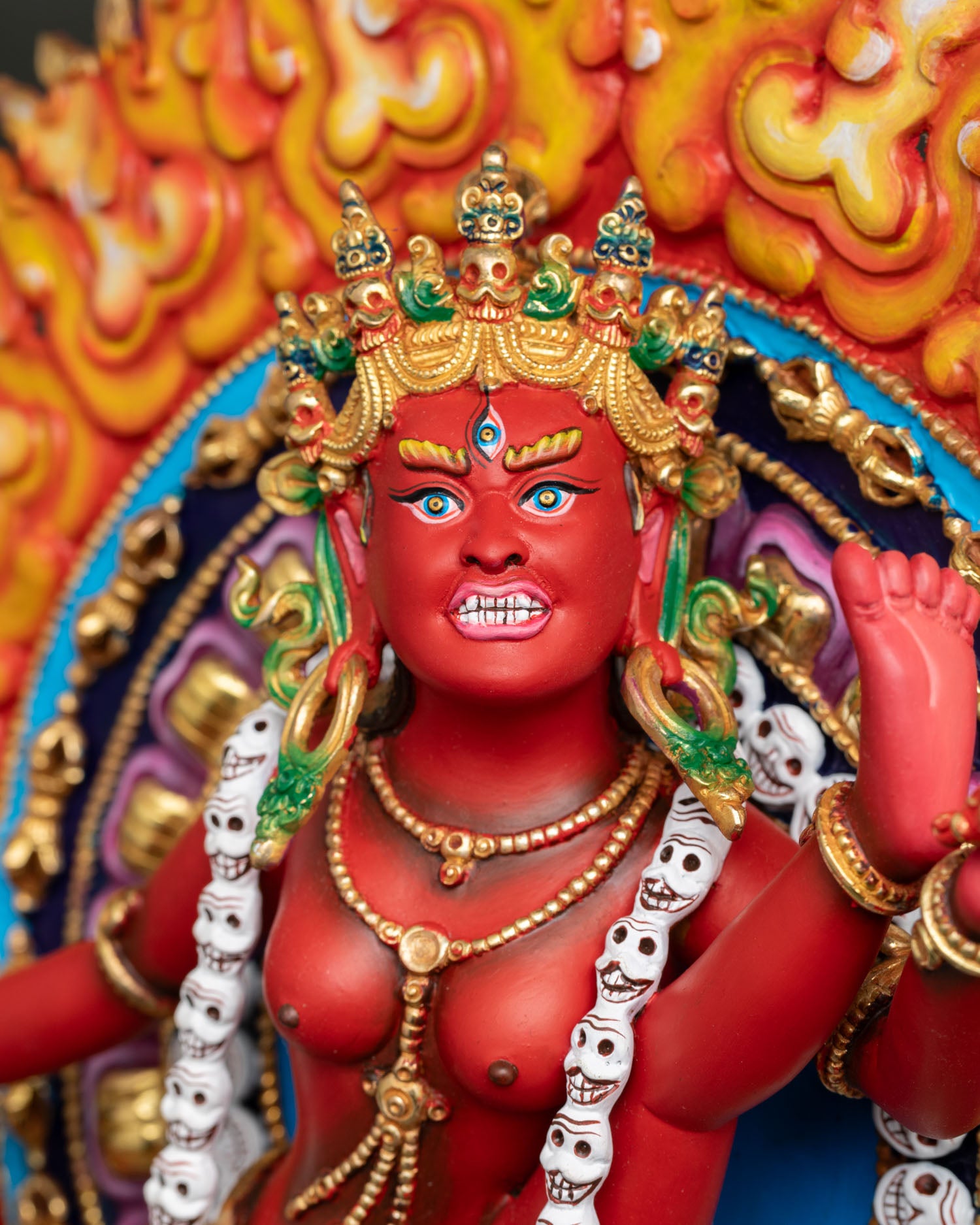 Close up view of Flying Vajrayogini Statue featuring detailed face, crown, jewelry, and traditional Vajrayana artistry