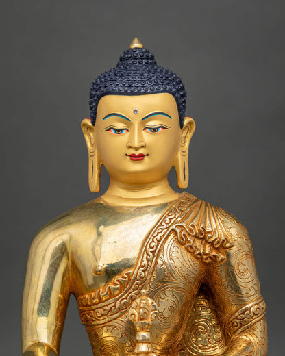 Close Up View of Mitrugpa Statue Gold Gilded Face and Intricately Carved Robe