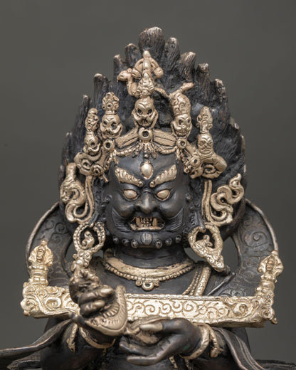 Close up view of Sakya Mahakala face detail, fierce wrathful expression, hand painted acrylic finish on Nepalese ritual sculpture
