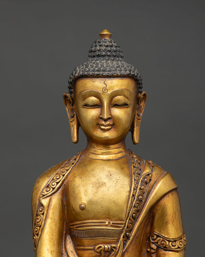Close up view of Shakyamuni Buddha serene face with detailed antique finish texture and traditional Himalayan lost wax copper craftsmanship spiritual Buddha sculpture