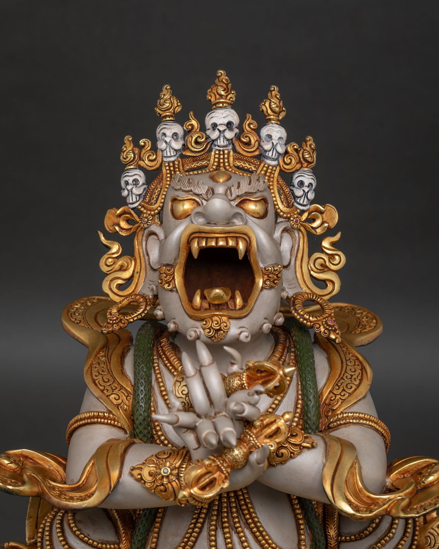 Close-up view of Vajradaka statue, hand-chased copper Buddhist altar sculpture