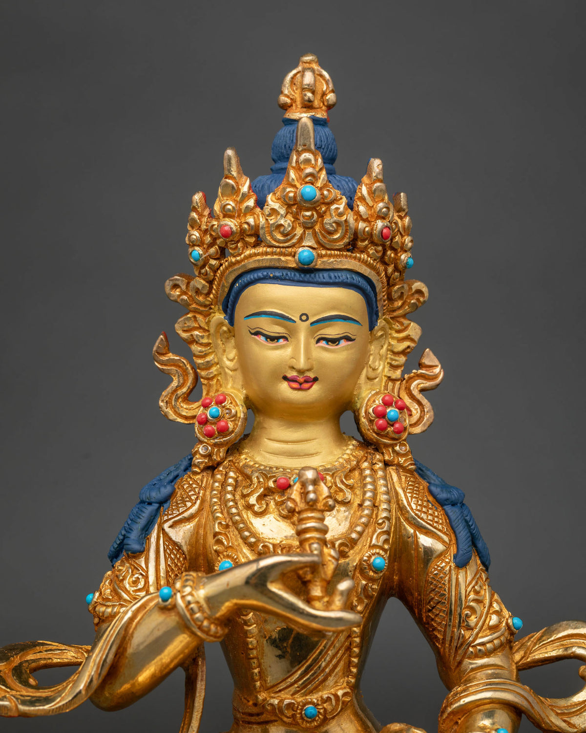 Close up view of Vajrasattva Statue with Five Jewel Crown and serene face