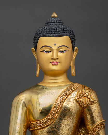 close up view shakyamuni buddha gold gilded copper floral robe carving turquoise coral details