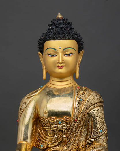 close up view shakyamuni buddha statue intricate nepalese copper gold gilded detail craftsmanship sacred buddhist art