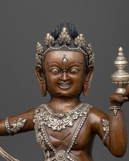 Close up of Virupaksha statue holding kapala skull cup and sacred vase