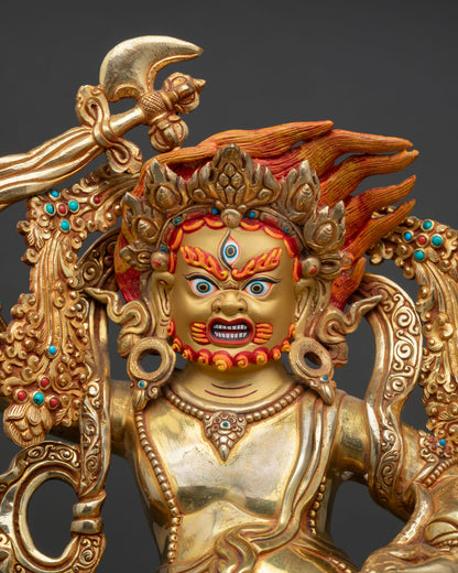 Close up White Dzambhala face gold gilded detailing semi precious stones Nepalese artisan craftsmanship Buddhist wealth deity