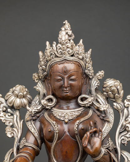 Close-up White Tara Buddhist statue oxidized copper finish robes and ornaments