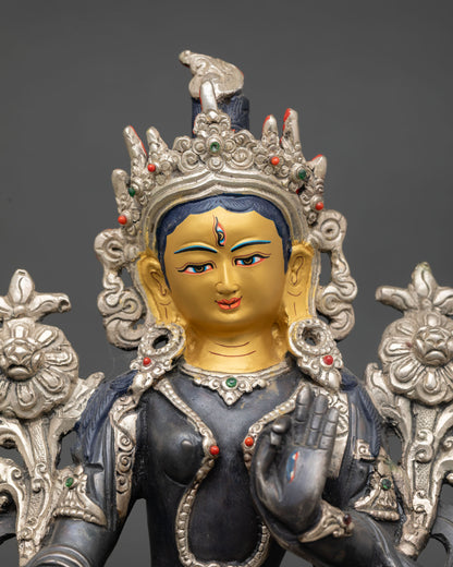 Close up White Tara goddess statue showing all seeing seven eyes symbolizing compassion and healing energy, Nepalese craftsmanship.