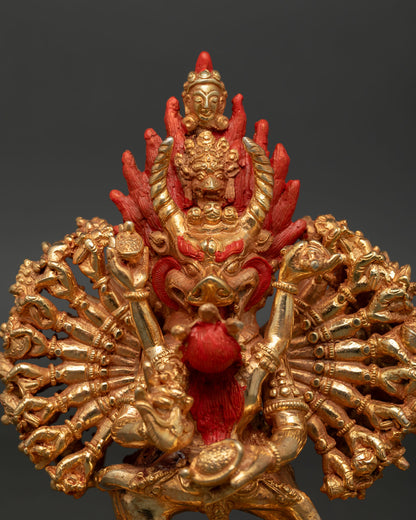 Close up Yamantaka face detail gold painted expression flaming wisdom halo vajrayana buddhist sculpture