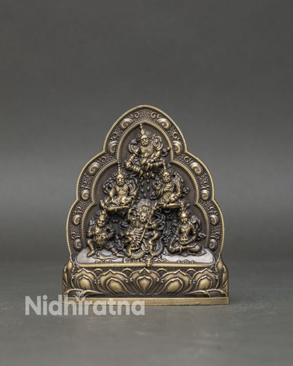 Close up Yellow White Black Red Green Jambhala deities intricate relief copper