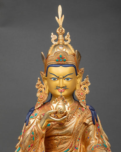 close-up of Guru Norlha Sculpture highlighting intricate lost wax craftsmanship and 24K gold gilding