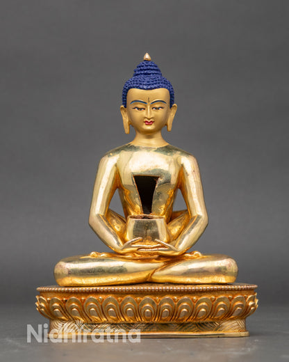 Side close-up of Samantabhadra face with intricate features and polished gold finish