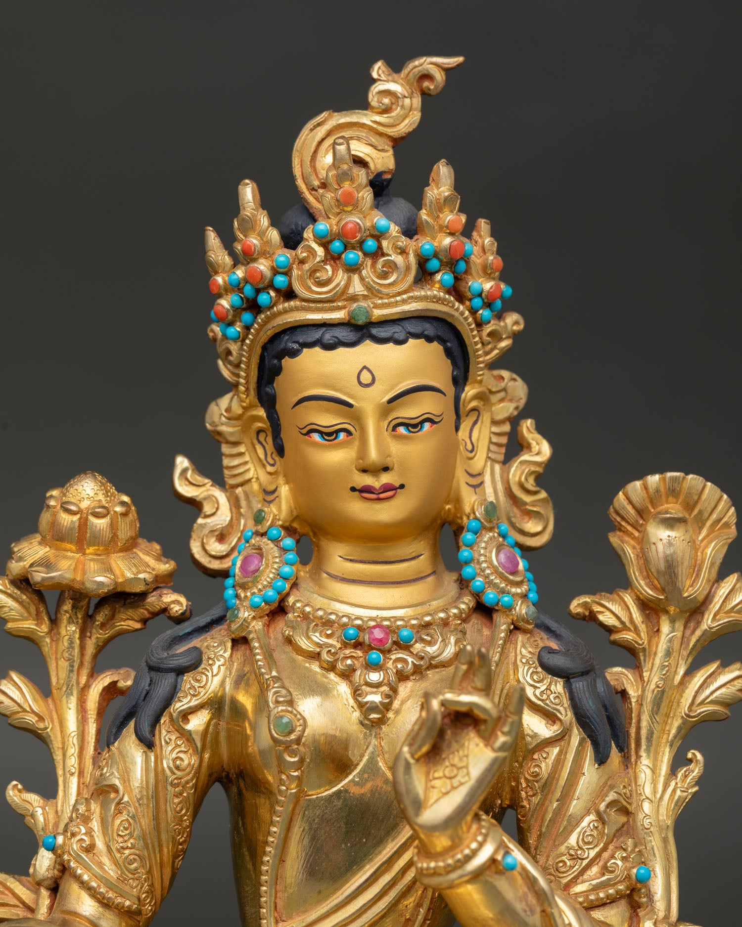 green-tara-buddhist-goddess-sculpture-seated-on-lotus-throne-with-extended-leg-posture-and-semi-precious-stone-adornments.