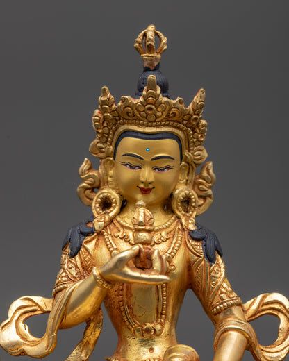 close up Dorje Sempa Vajrasattva idol showing serene face and ornate crown
