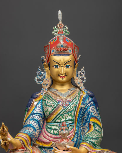 close up Guru Padmasambhava Statue showing skull cup vajra and hand-painted kasaya robe