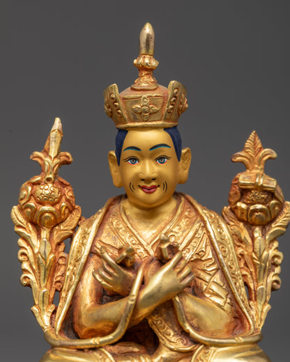 close up Gyalwang Karmapa statue face with Tibetan black crown and serene expression