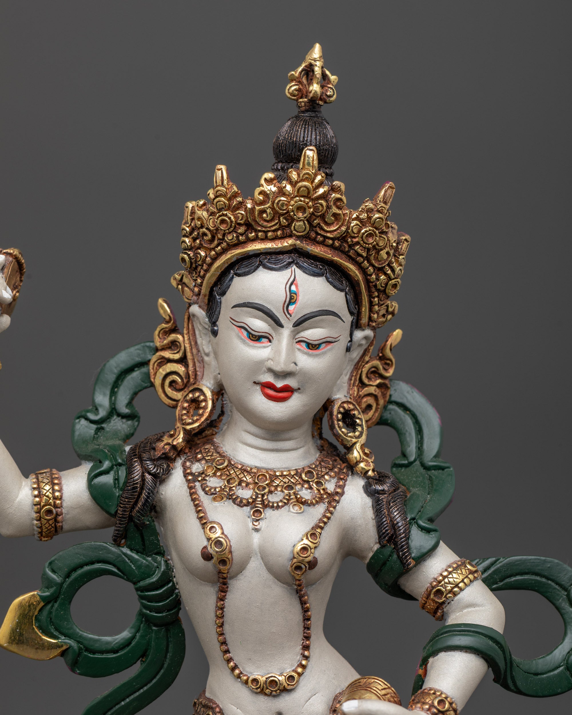 close up Machig Labdron Statue showing detailed face and gold-plated jewelry
