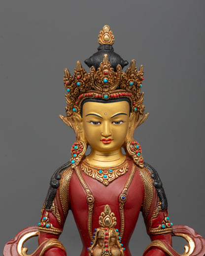 close up of Amitayus gold-gilded face with nectar vase and semi-precious stones
