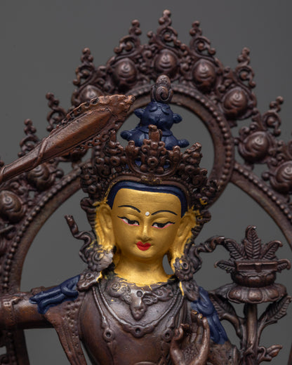 close up of manjushri's sword and utpala flower holding sacred scripture for spiritual clarity