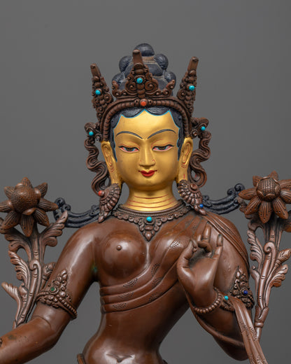 close up of tara devi’s gold-gilded face with carved crown and semi-precious stone inlays