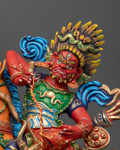 close up red-hued Tsengo Rolpa Chudan face with wrathful expression and staff
