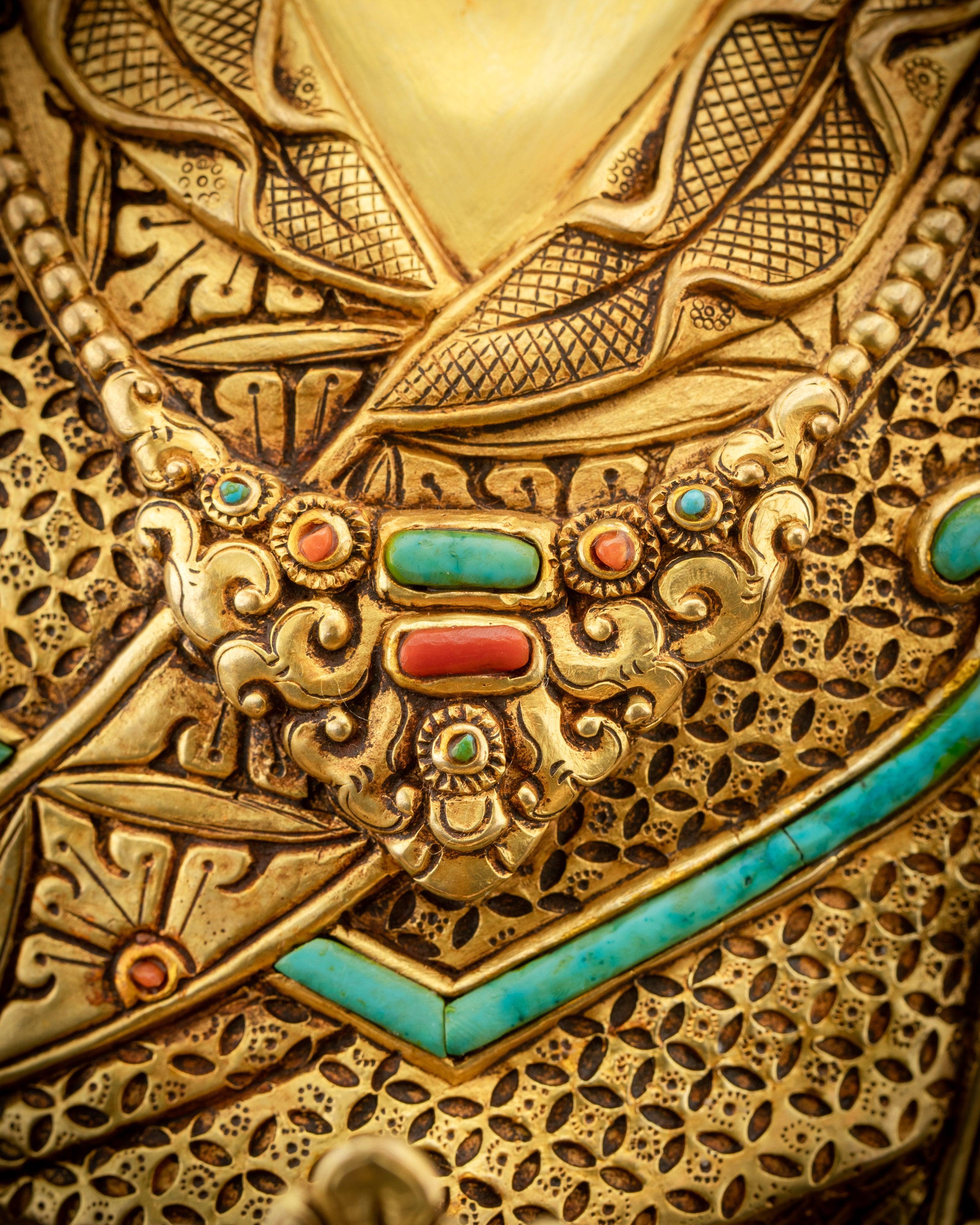 close up view of jewelries Padmasambhava statue gold gilded Guru Rinpoche ornaments
