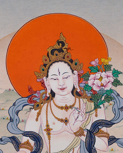 close up white tara thangka print with varada mudra and utpala blue lotus flower details