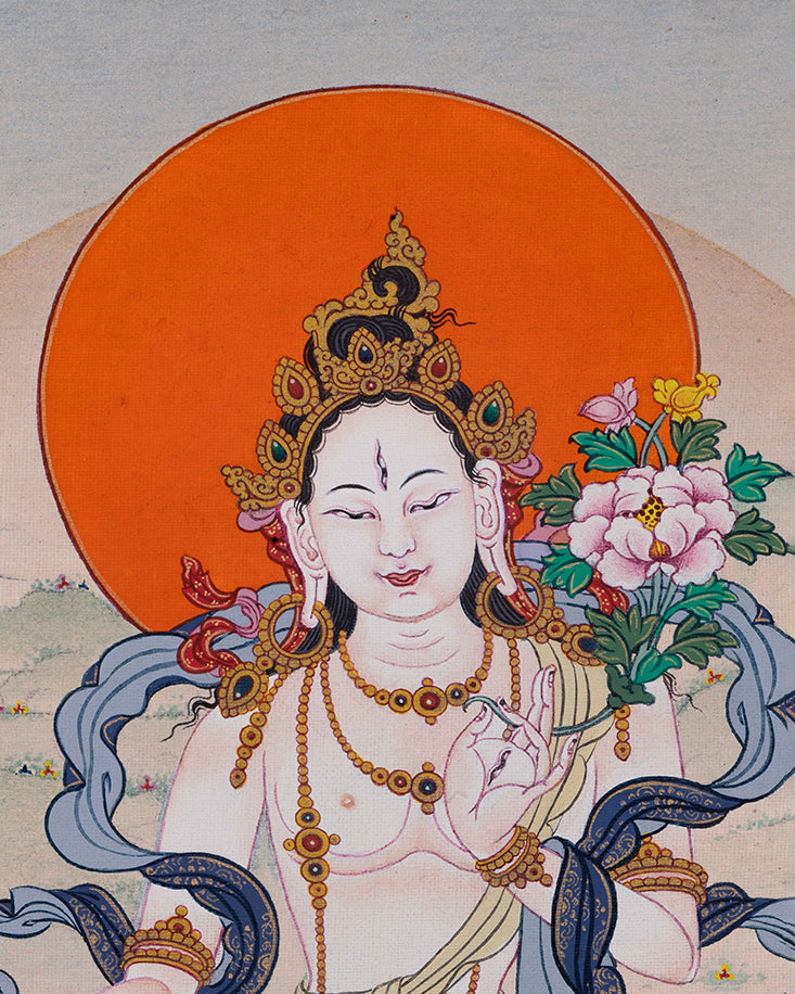 close up white tara thangka print with varada mudra and utpala blue lotus flower details