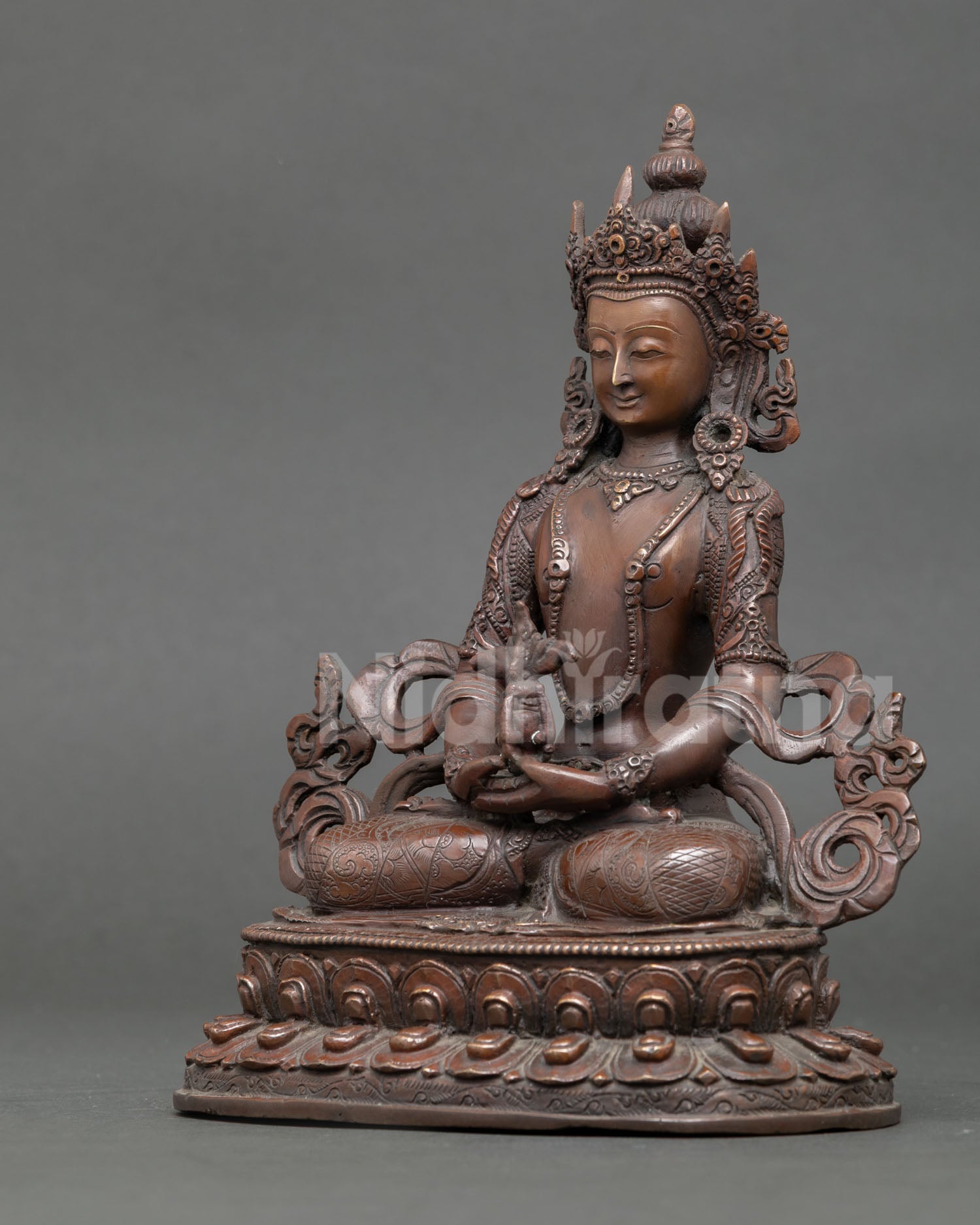 Copper Amitayus Buddha statue on a double lotus pedestal, handmade in Patan, Nepal.