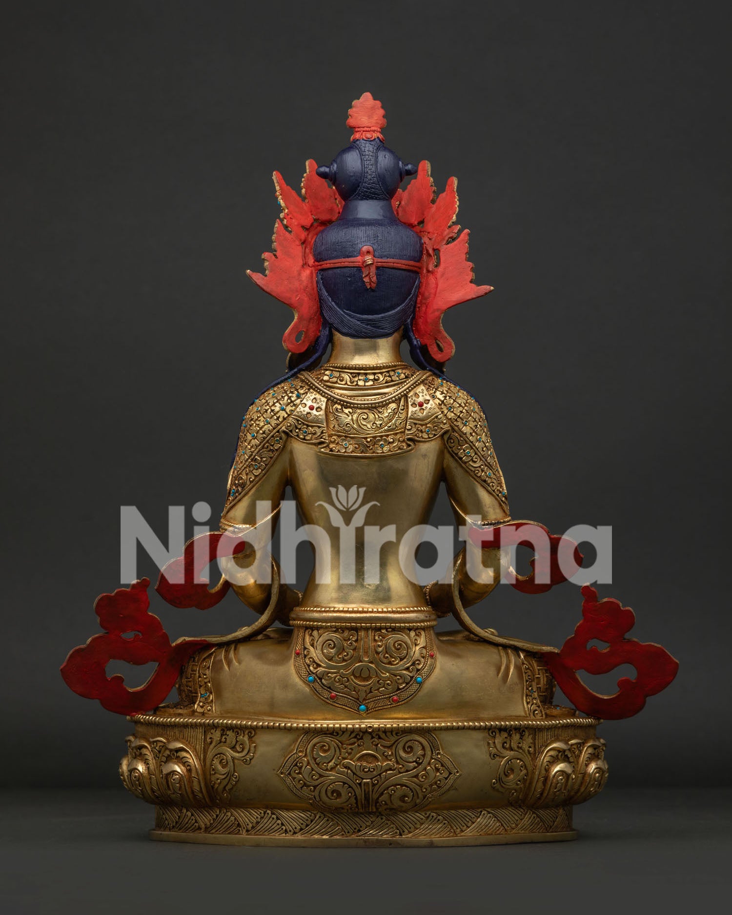 Copper Amitayus Buddha statue with floral carvings, handcrafted by Newari artisans.