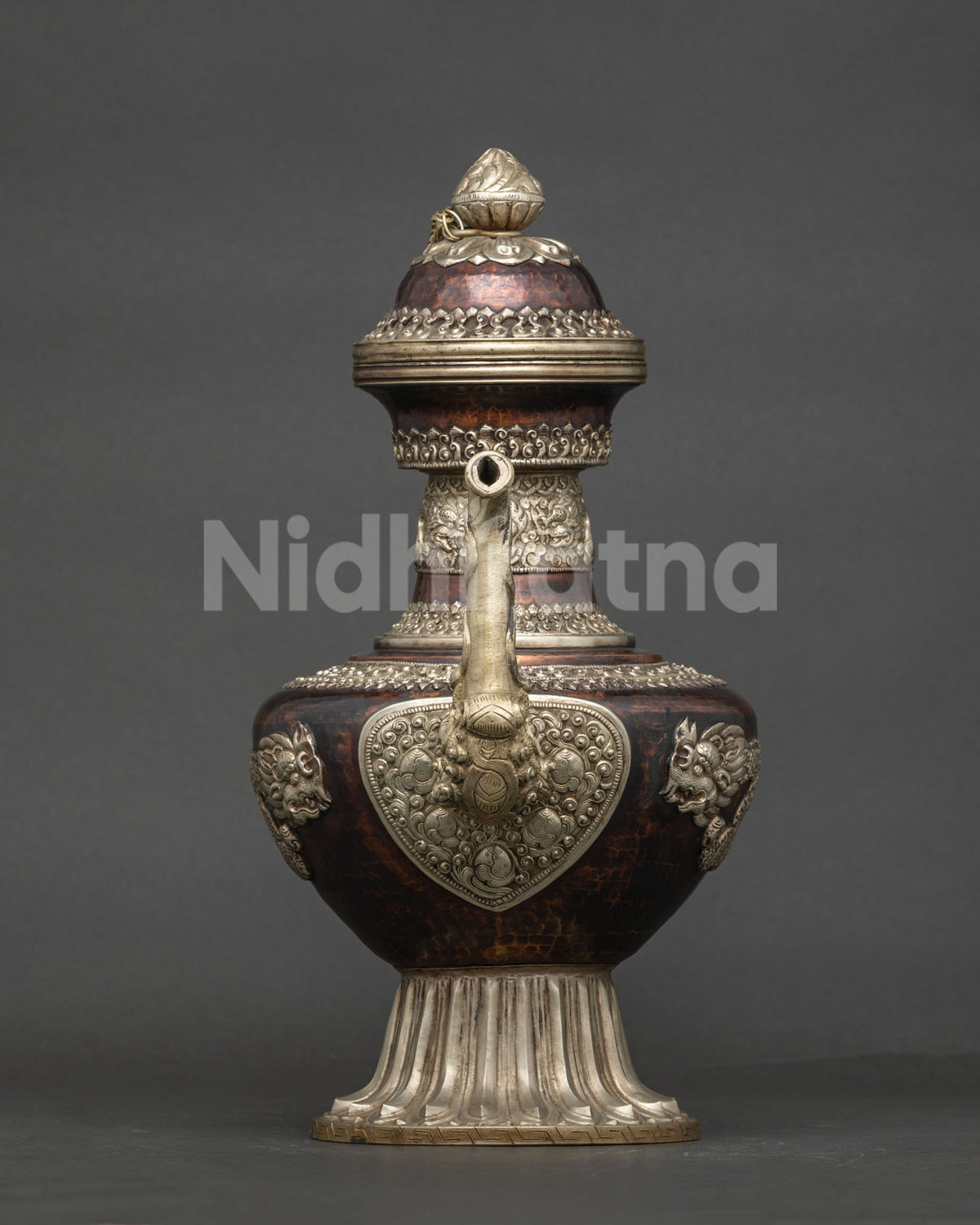 Copper Tea Pot close up showing intricate silver plated dragon carvings