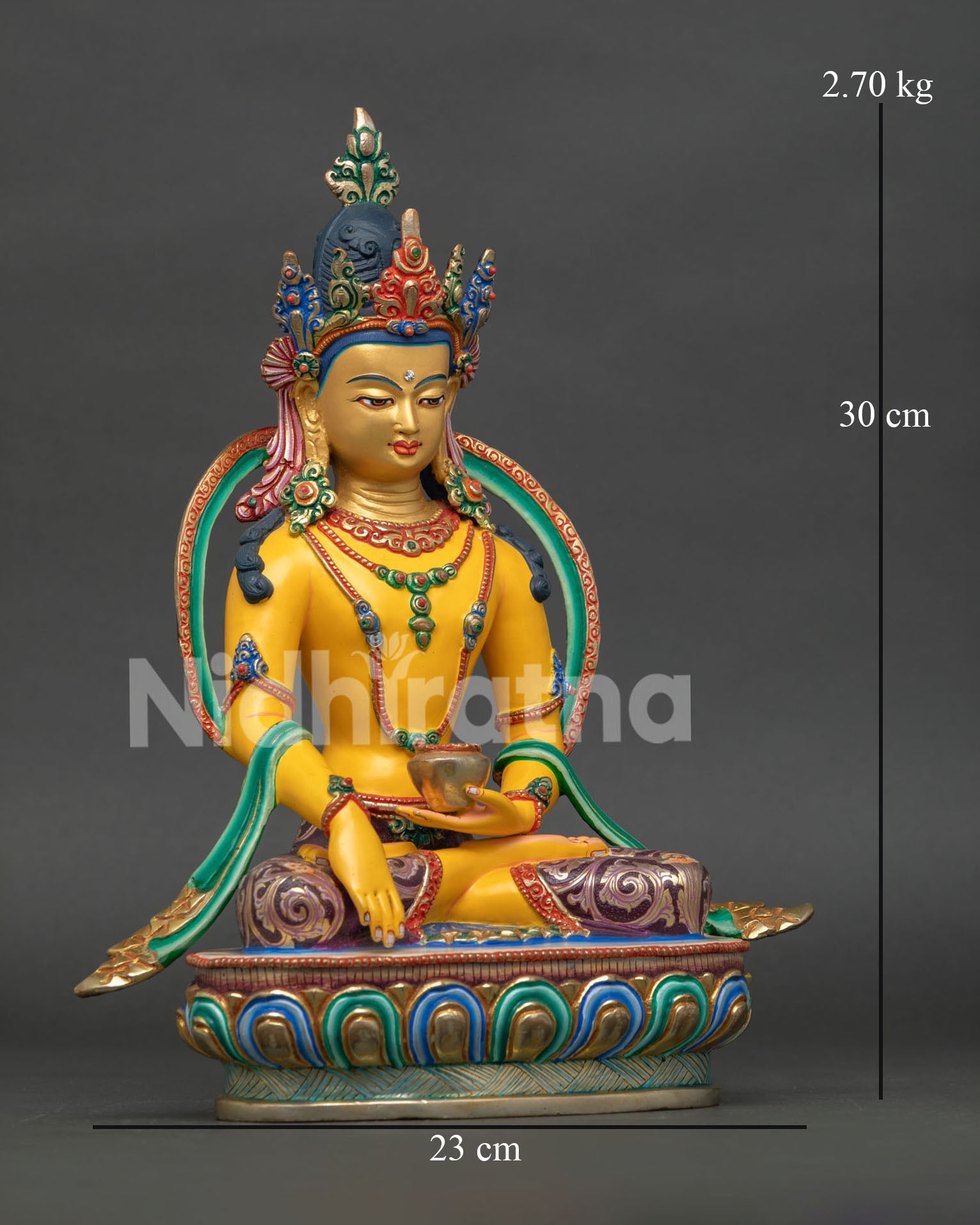 Crowned Shakyamuni Buddha seated in bhumisparsha mudra with begging bowl on lotus pedestal