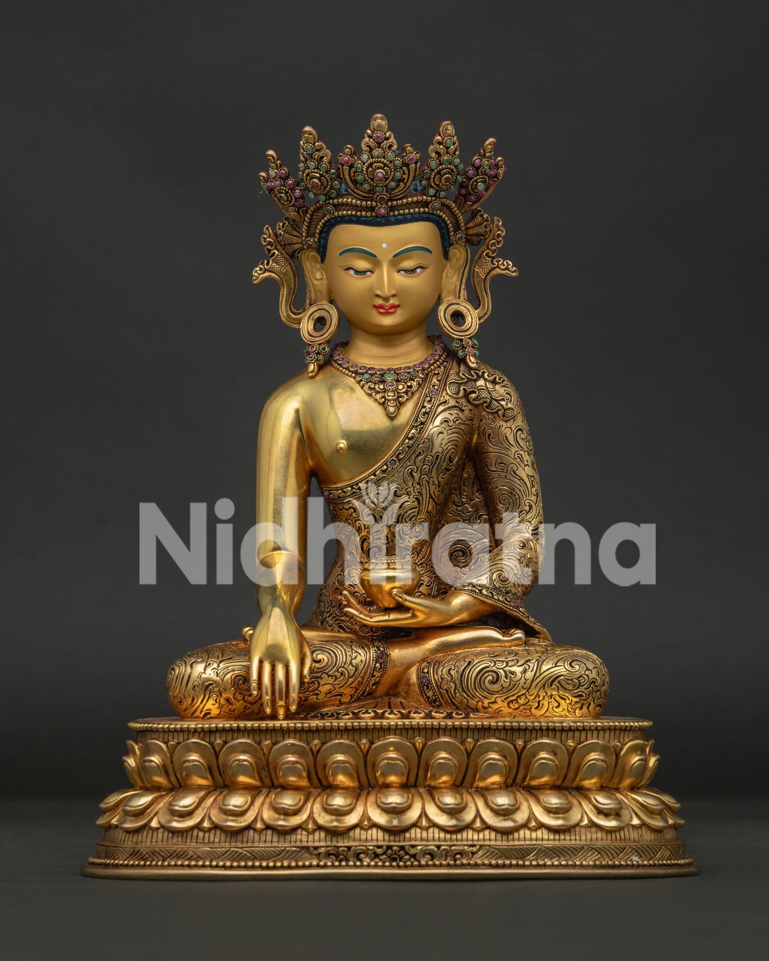 crowned shakyamuni buddha statue front view with gold fire gilding and gemstone details
