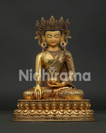 crowned shakyamuni buddha statue front view with gold fire gilding and gemstone details