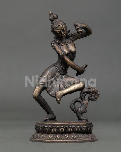 Dancing Cintamani Lokeshvara statue pair with detailed jewelry and flowing scarves