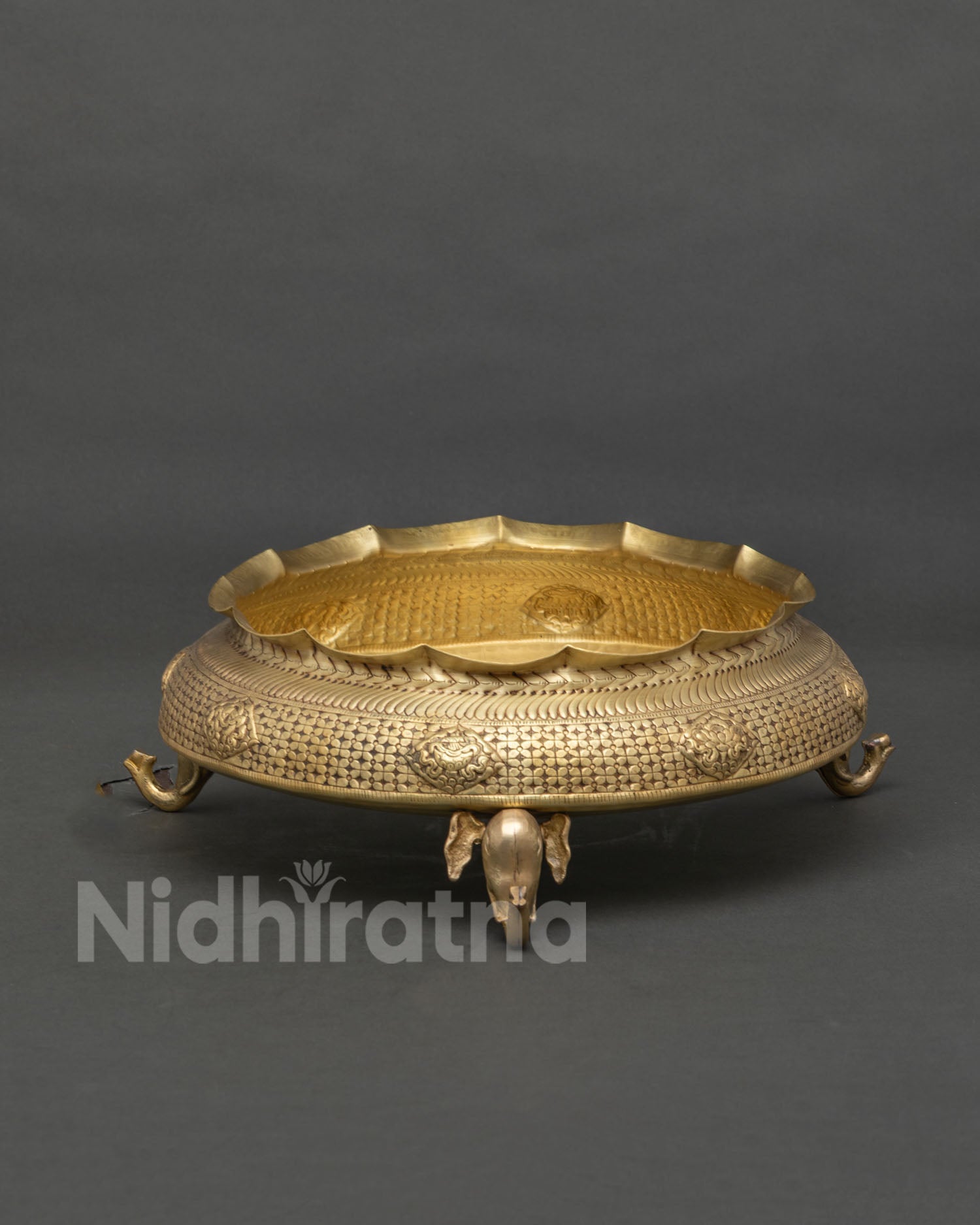 Decorative Brass Urli Bowl With Detailed Engravings And Curved Patterns