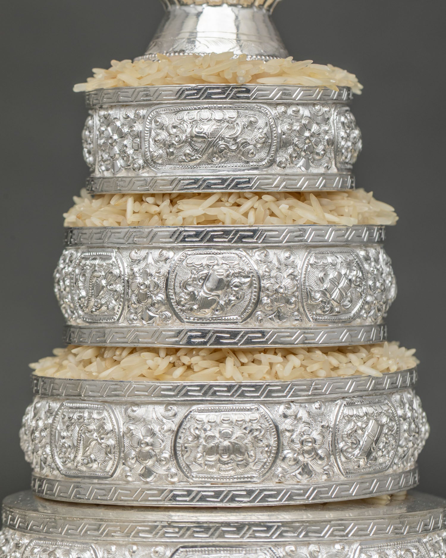 Detail of Hand-Engraved Eight Auspicious Symbols on Silver Mandala Offering Ring