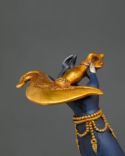 Detail of Troma Nagmo Statue holding a ritual curved knife with fine handcrafted details.