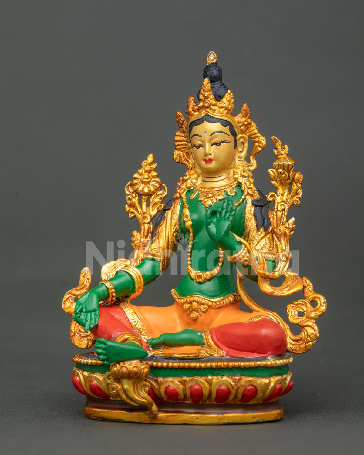 Detail view of Green Tara with Varada Mudra and utpala lotus stem.