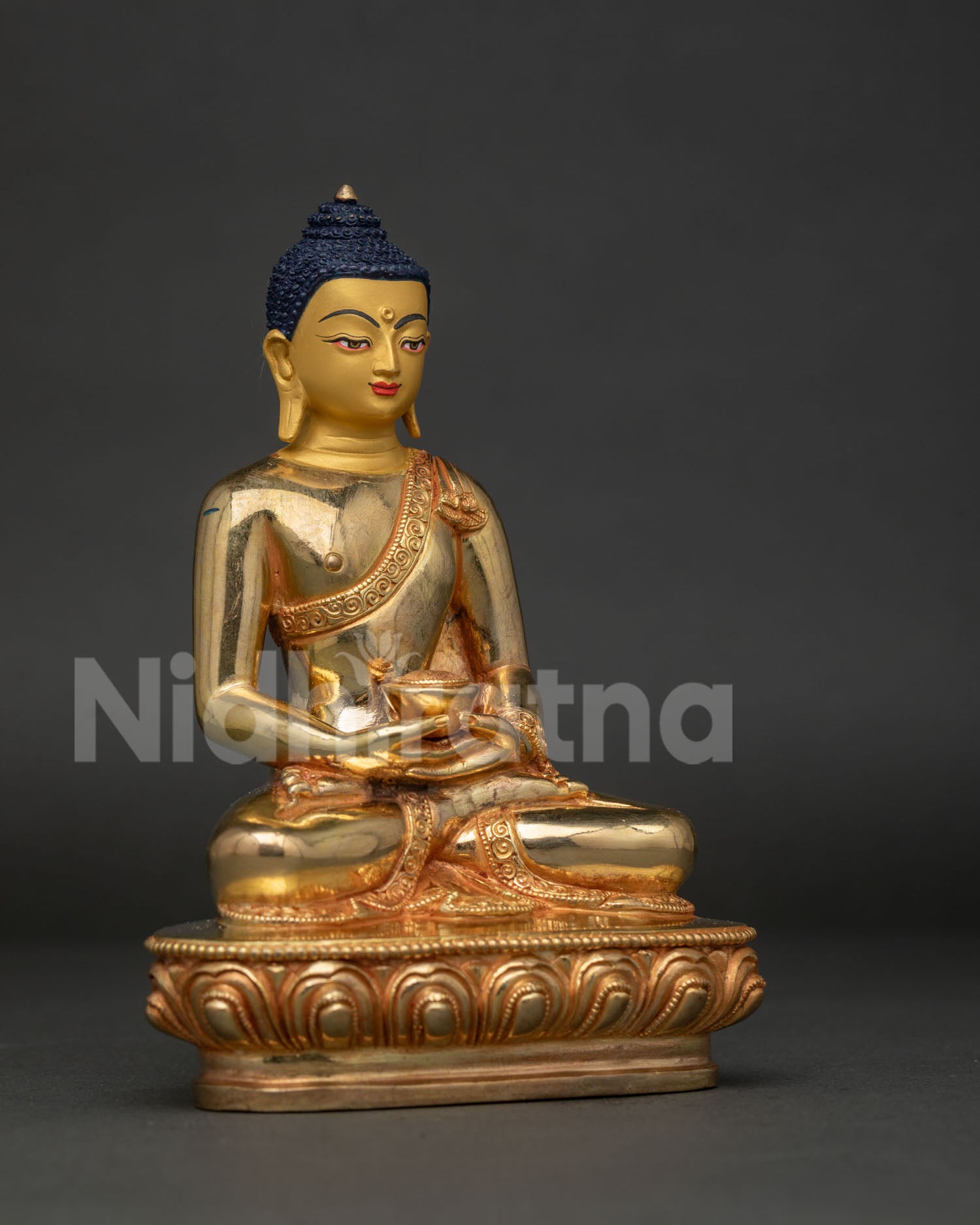 Detailed Amitabha Buddha Face with Gold Gilded Craftsmanship and Traditional Motifs.