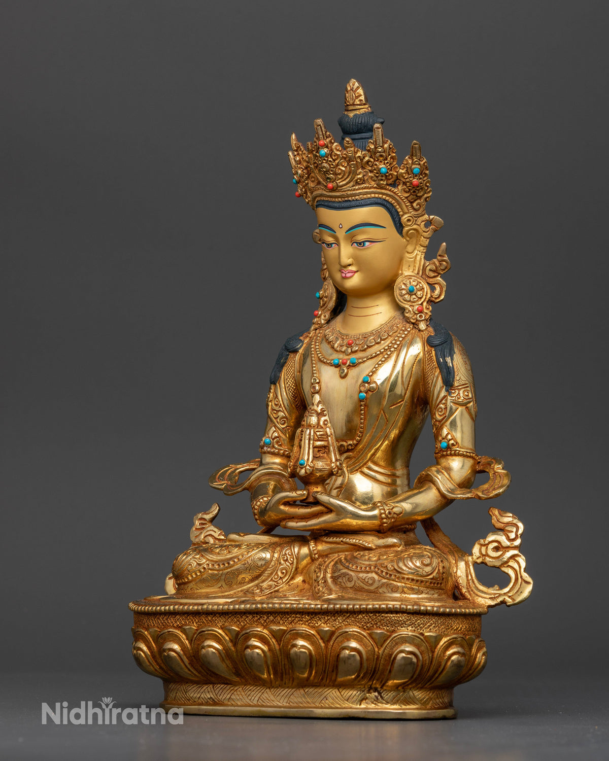 Detailed Amitayus Buddha statue with ornate five-jewel crown and floral silk robe.