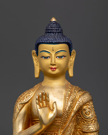 Detailed Amoghasiddhi Buddha Statue with 24K gold painted calm expression.