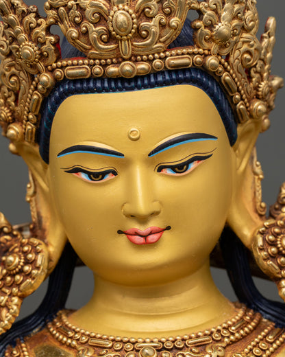 Detailed close-up of Green Tara face, displaying compassionate expression