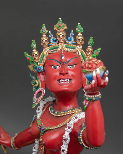 detailed close up face of vajrayogini statue, fierce dakini expression, gold gilded